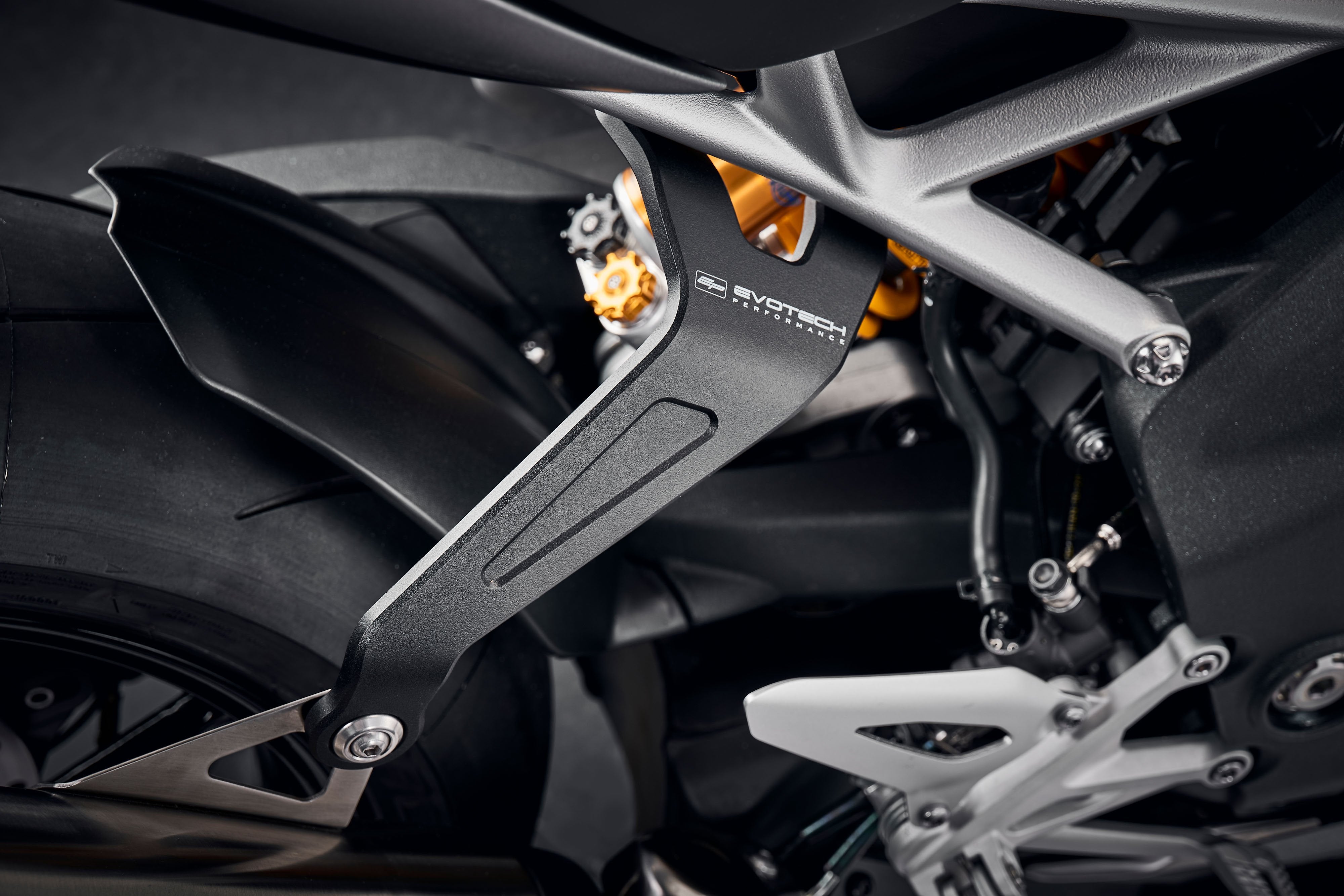 Evotech Exhaust Hanger (Black) - Triumph Speed Triple 1200 RS (2025+)